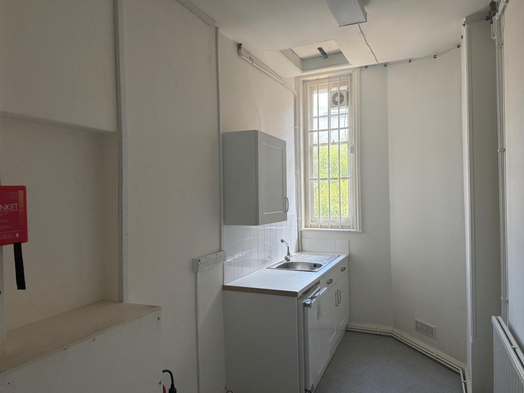 Lot: 118 - FORMER BANK PREMISES - UPPER PARTS PLUS PARKING WITH POTENTIAL - View of first floor kitchen